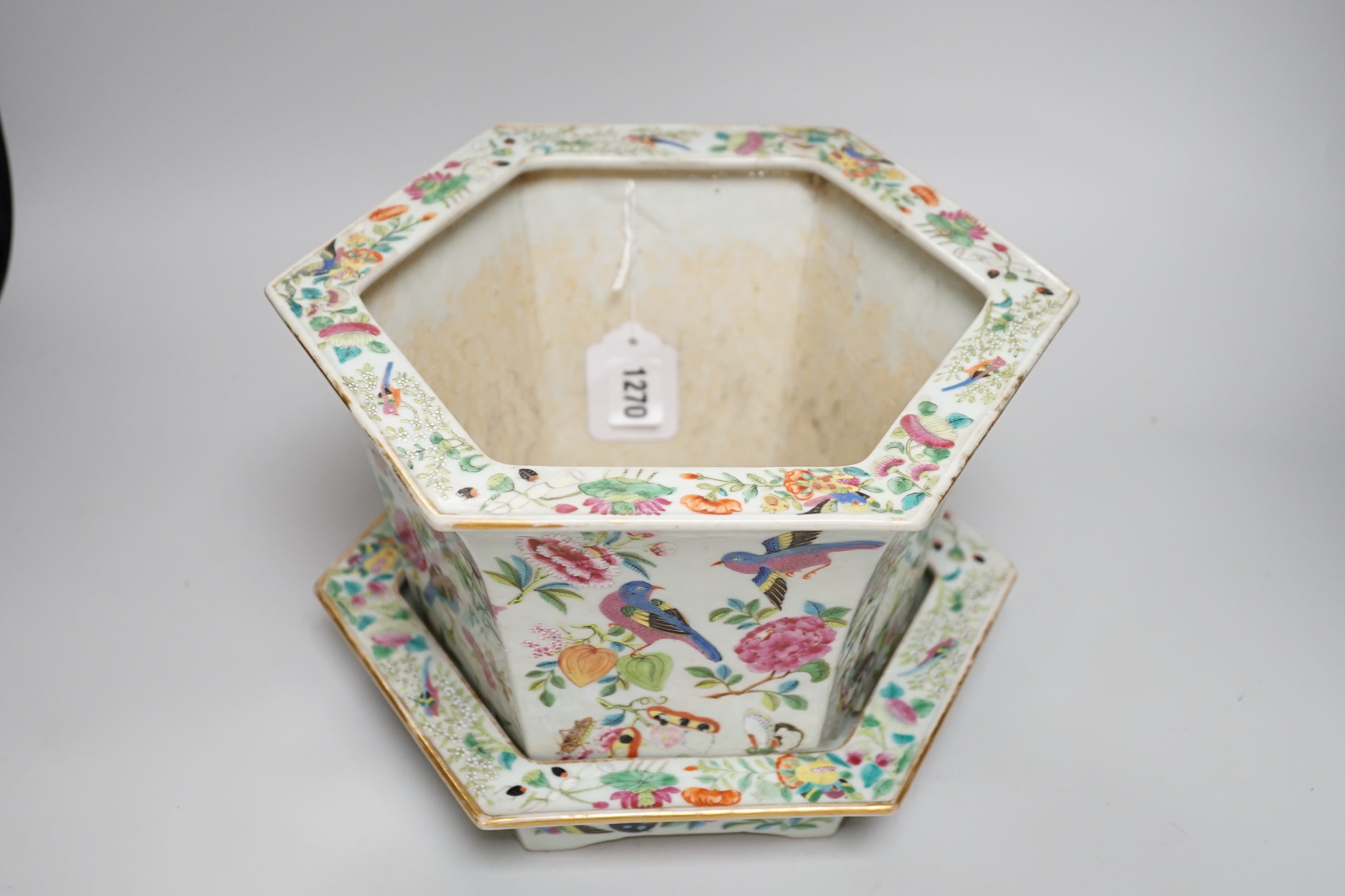 A 19th century Chinese Canton decorated famille rose hexagonal planter a/f and stand, 18.5cm high